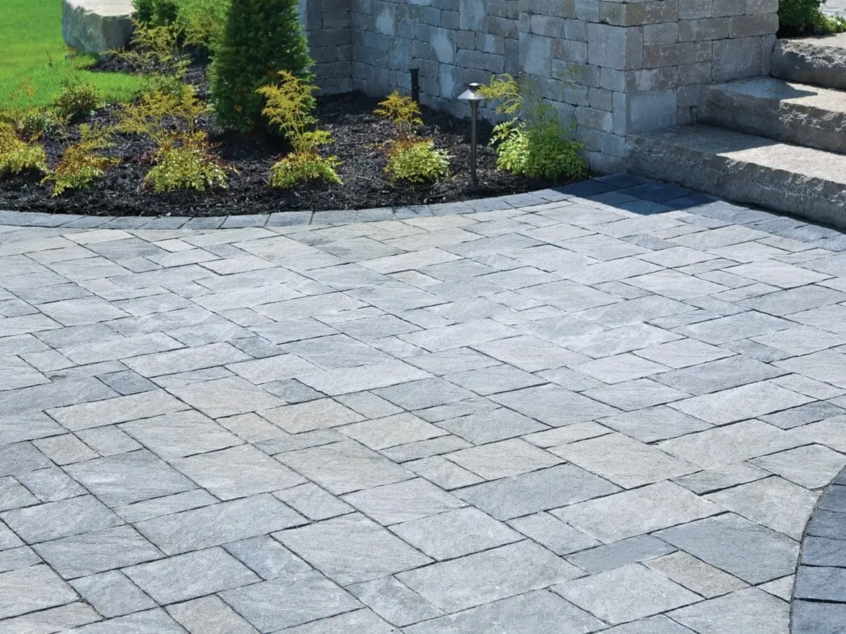 A beautifully constructed patio and walkway made with interlocking paving stones in maple ridge by maple ridge.