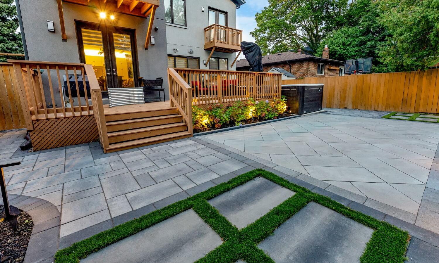 Finished backyard with deck garden and paving working together